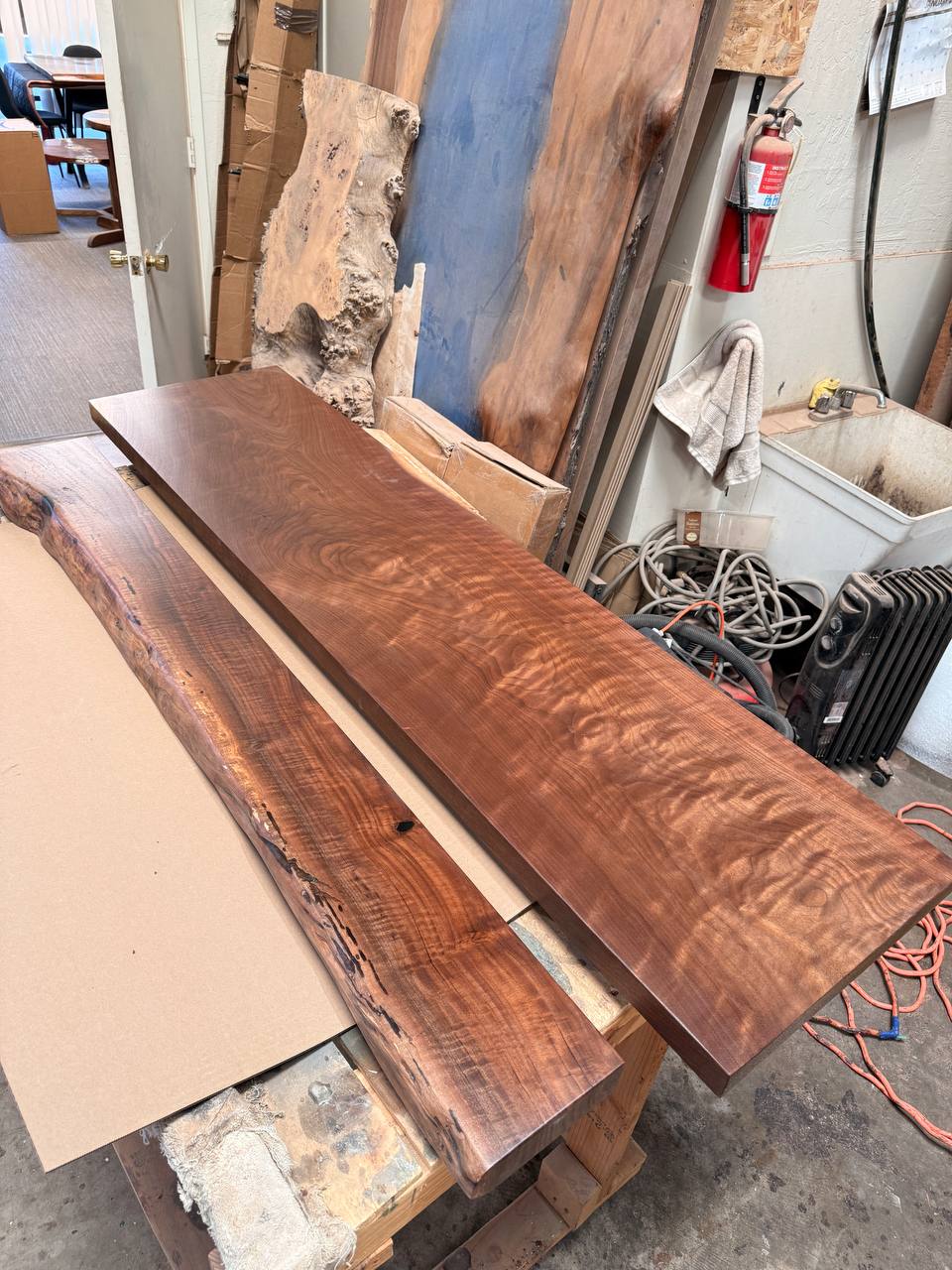 Kevin’s solid walnut mantel and straight-edge hearth bench together in the FamilyWood workshop