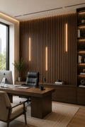 Modern office interior with a wooden desk, chair, and bookshelf.