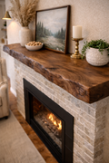 Rustic walnut fireplace mantel beam with live edge wood texture