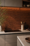 Modern kitchen with wooden backsplash, gray cabinets, and various kitchen items.