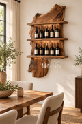 Two tier walnut wall wine rack holding upright bottles above a dining table